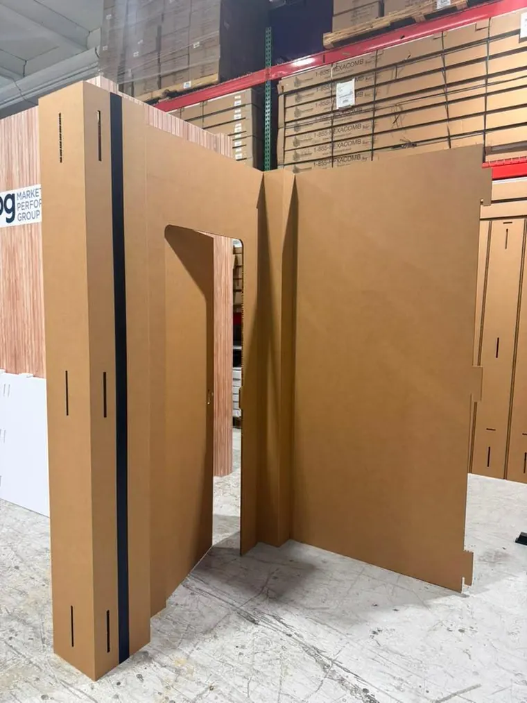 Assembled door and wall in natural kraft board